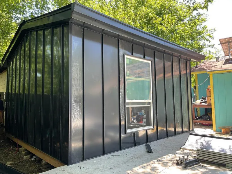 Black standing seam metal wall panels for Roof Inspection in Bogalusa