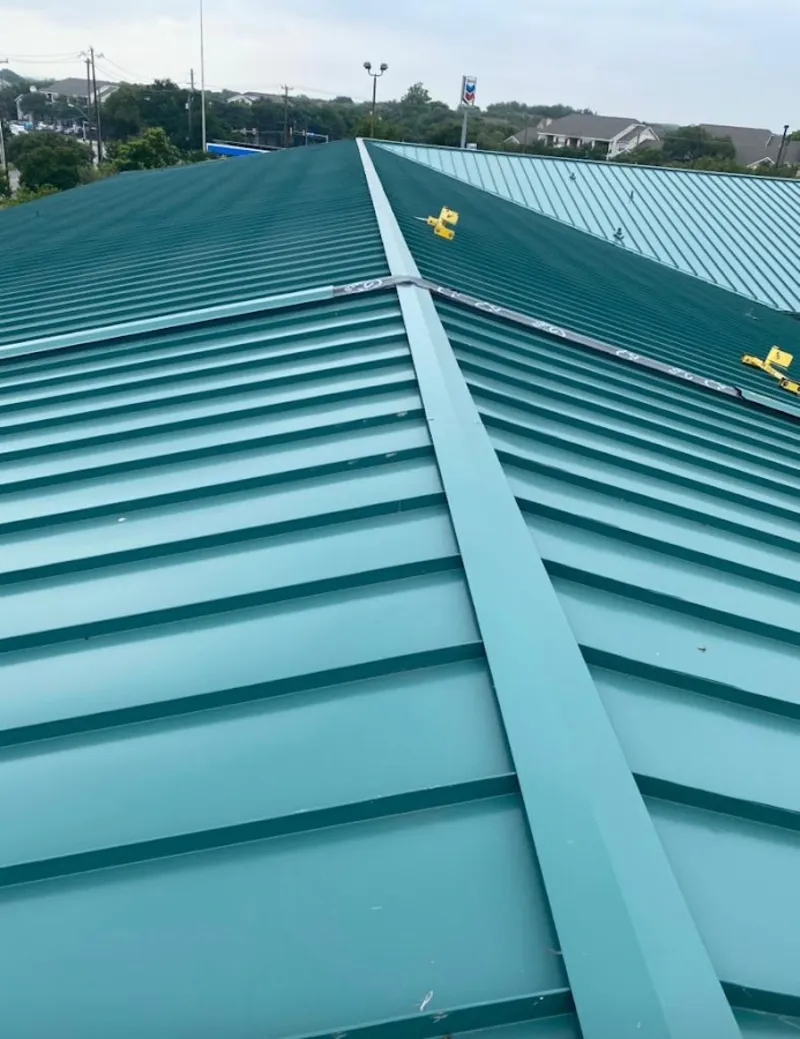 Green commercial metal roof ridge and valley for Metal Roof Repair in Bogalusa